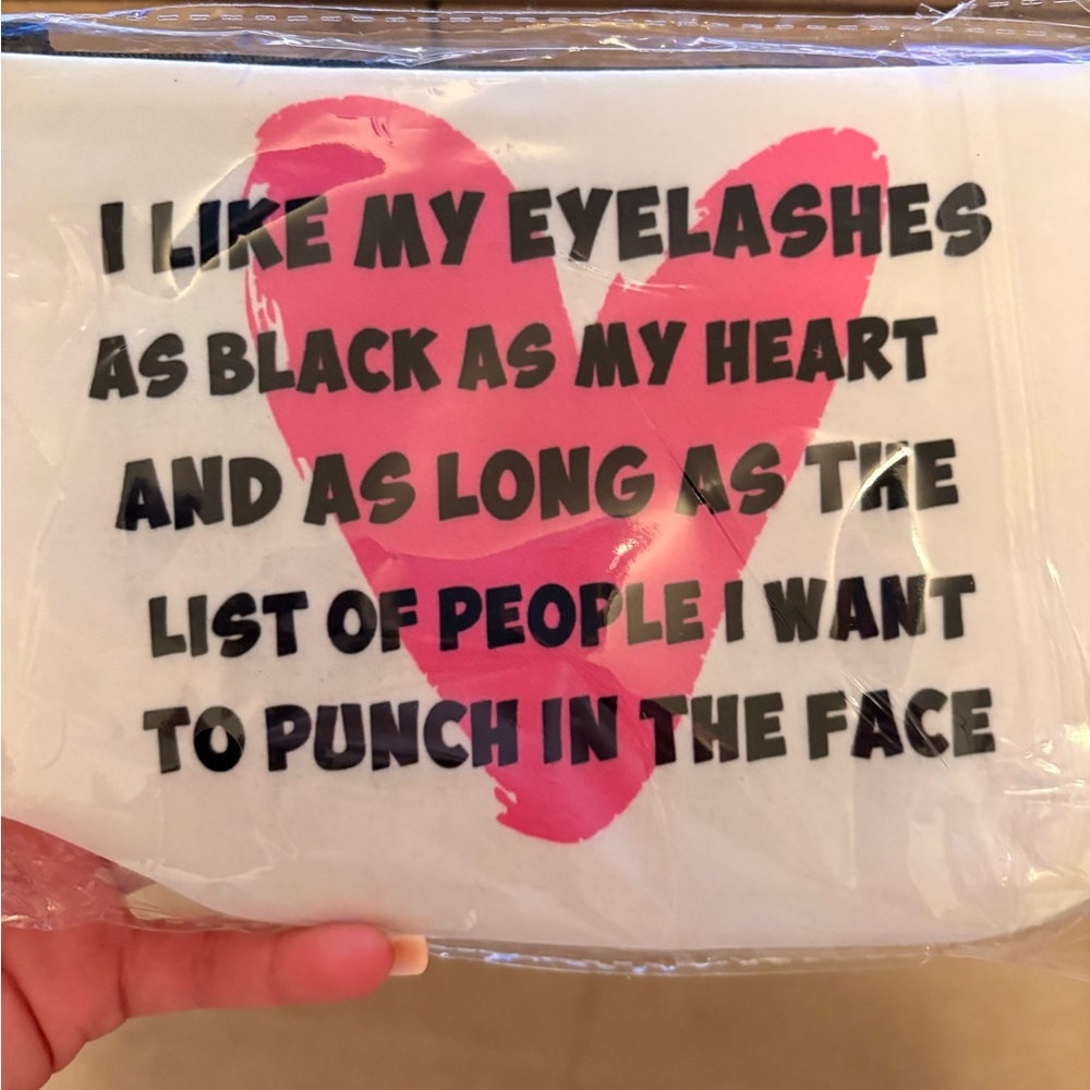 White and Pink Makeup Bag with Bold Text